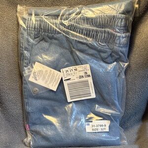 Woman Within Light Blue Jeans